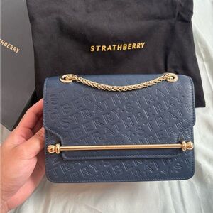 Strathberry East West Mini Embossed Blue Crossbody Bag with Gold Accents